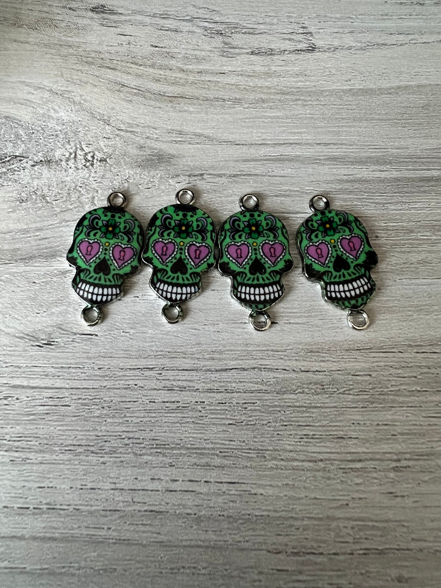 Green candy skull charms