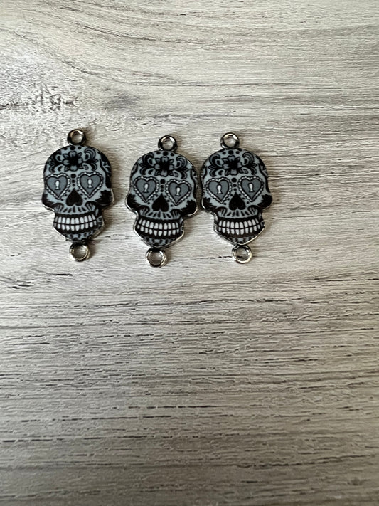 Black candy skull charms