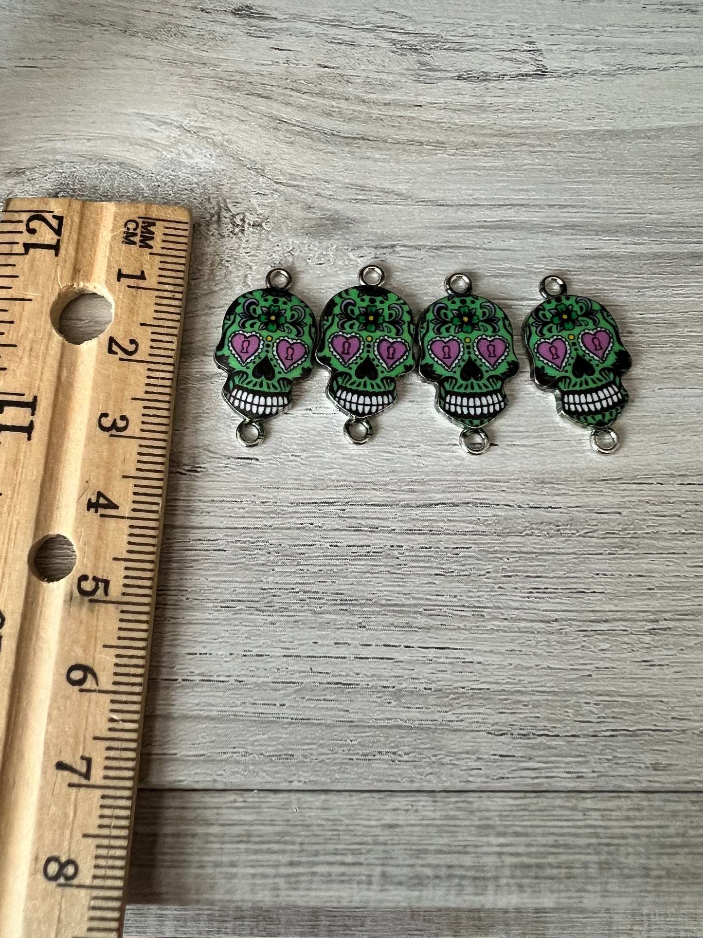 Green candy skull charms