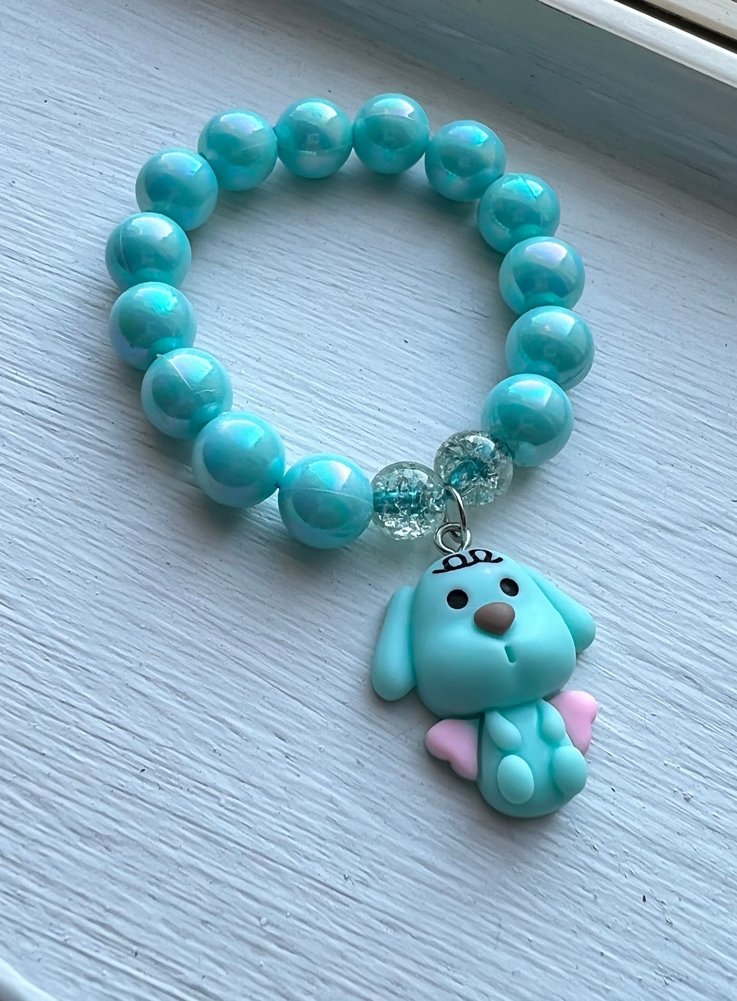 Blue dog w/ wings bracelet