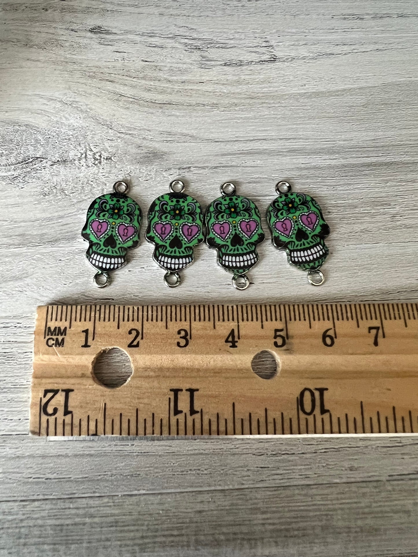 Green candy skull charms